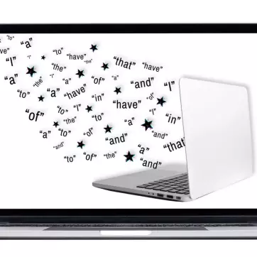 Image of words emerging from a laptop